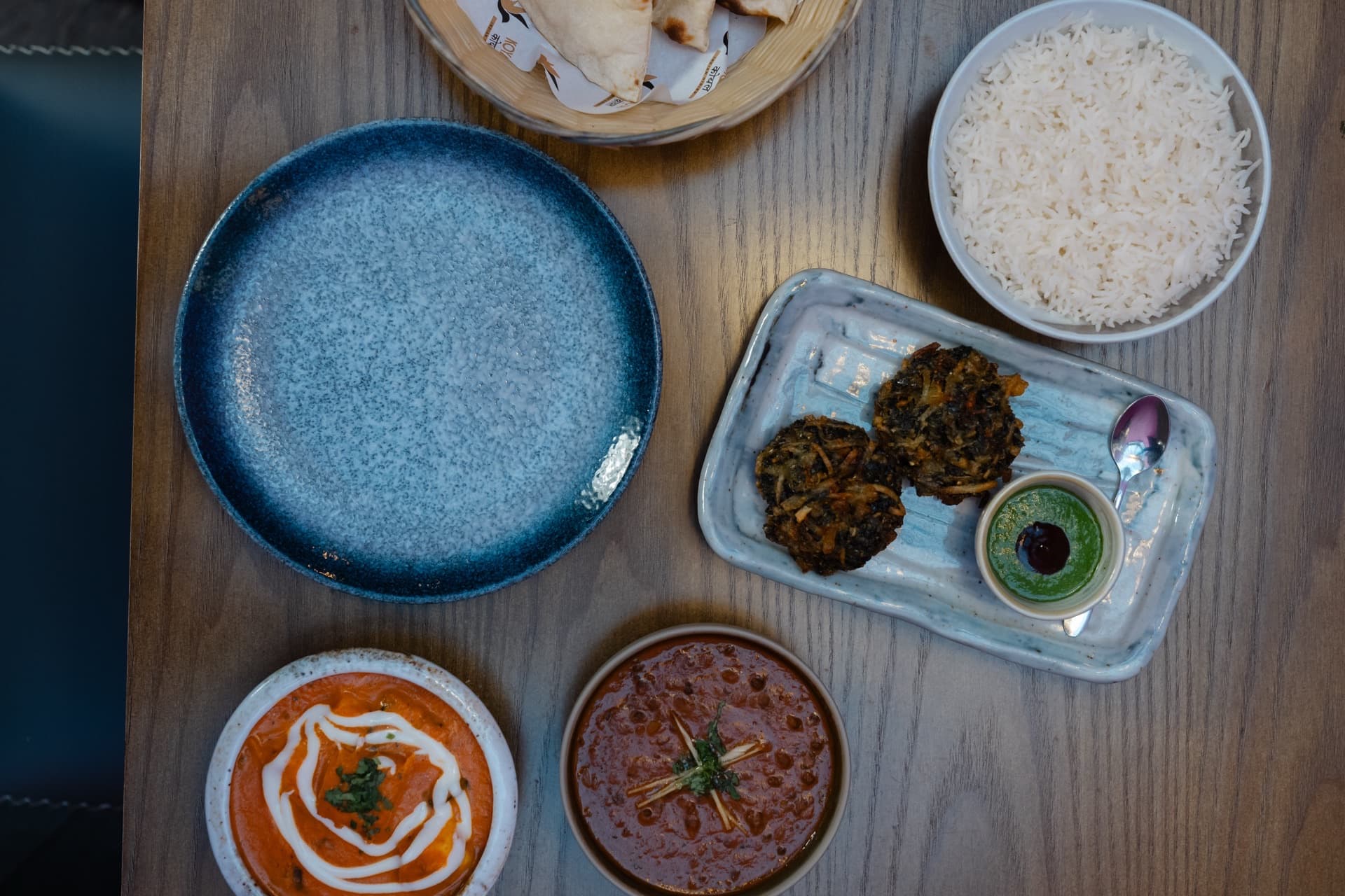 Vegan Indian dishes - dal, pakora and naan at Koyal Indian Restaurant Surbiton