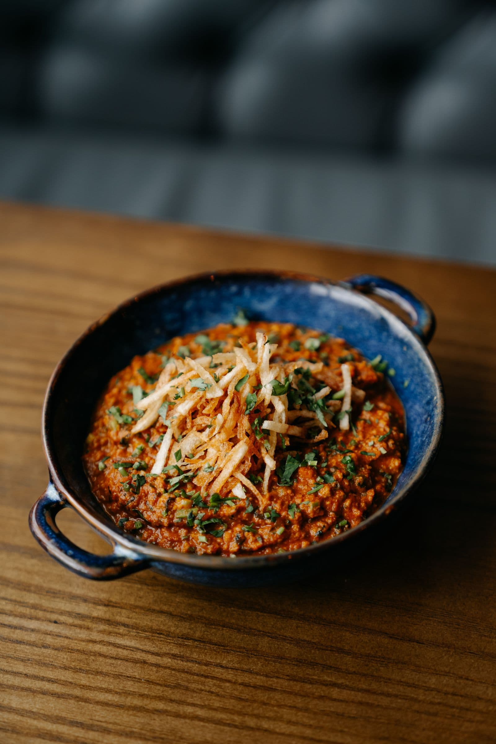 A slow-cooked curry dish at Koyal Indian Restaurant