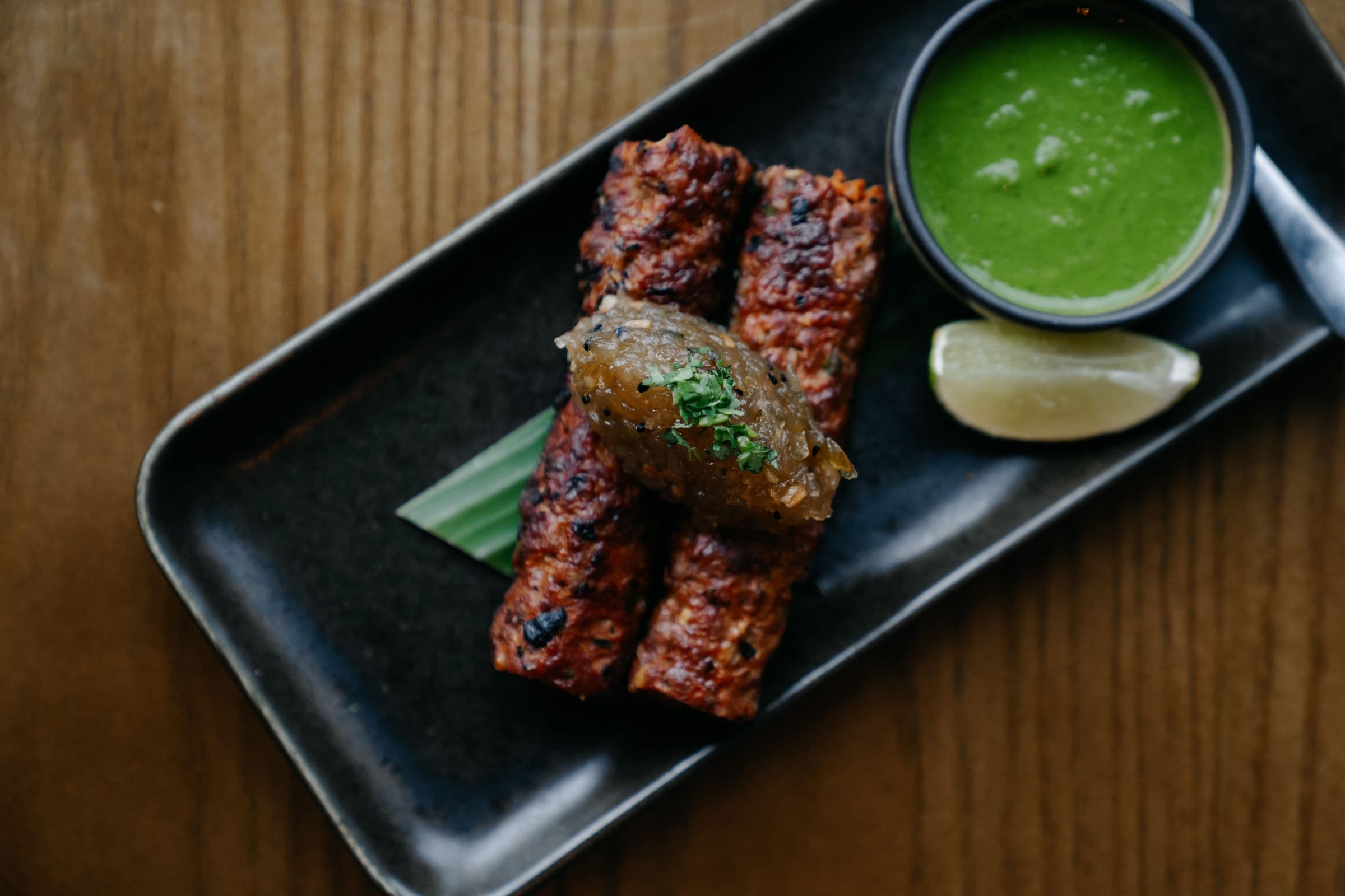 Tandoori dish with cocktail at Koyal