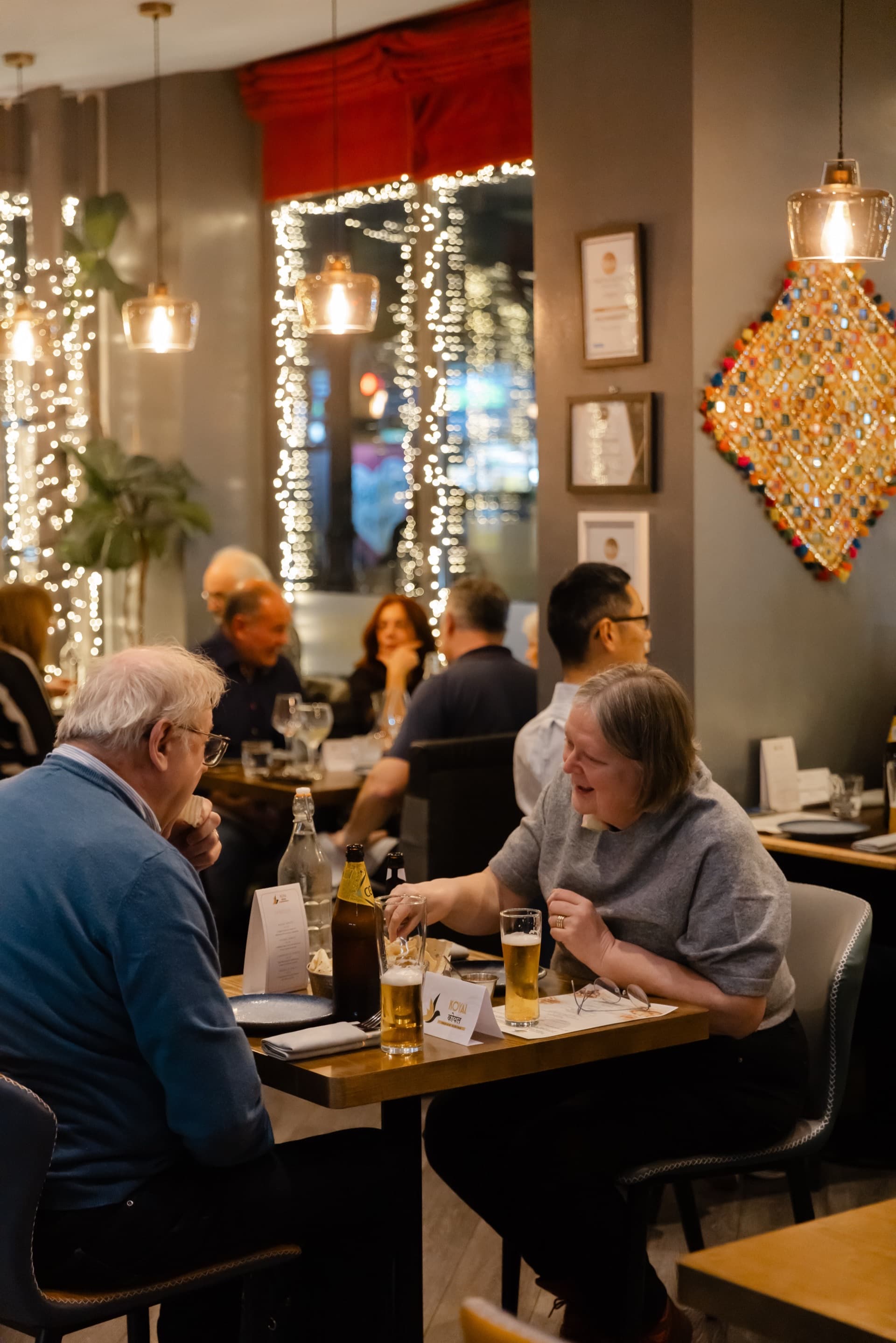 Guests enjoying dinner at Koyal's Indian whisky and food pairing event